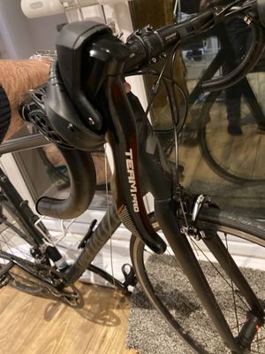 Road bike with new shifters applied. The "TEAM PRO" logo is visible